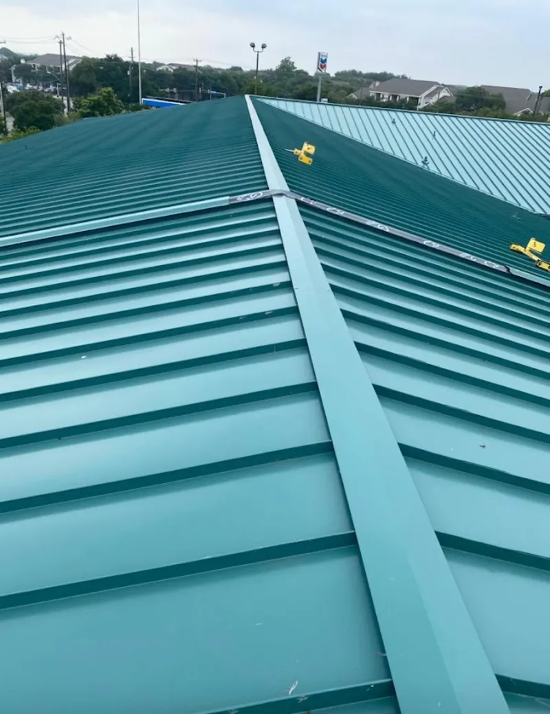 Green commercial metal roof ridge and valley for Metal Roof Repair in Northlake